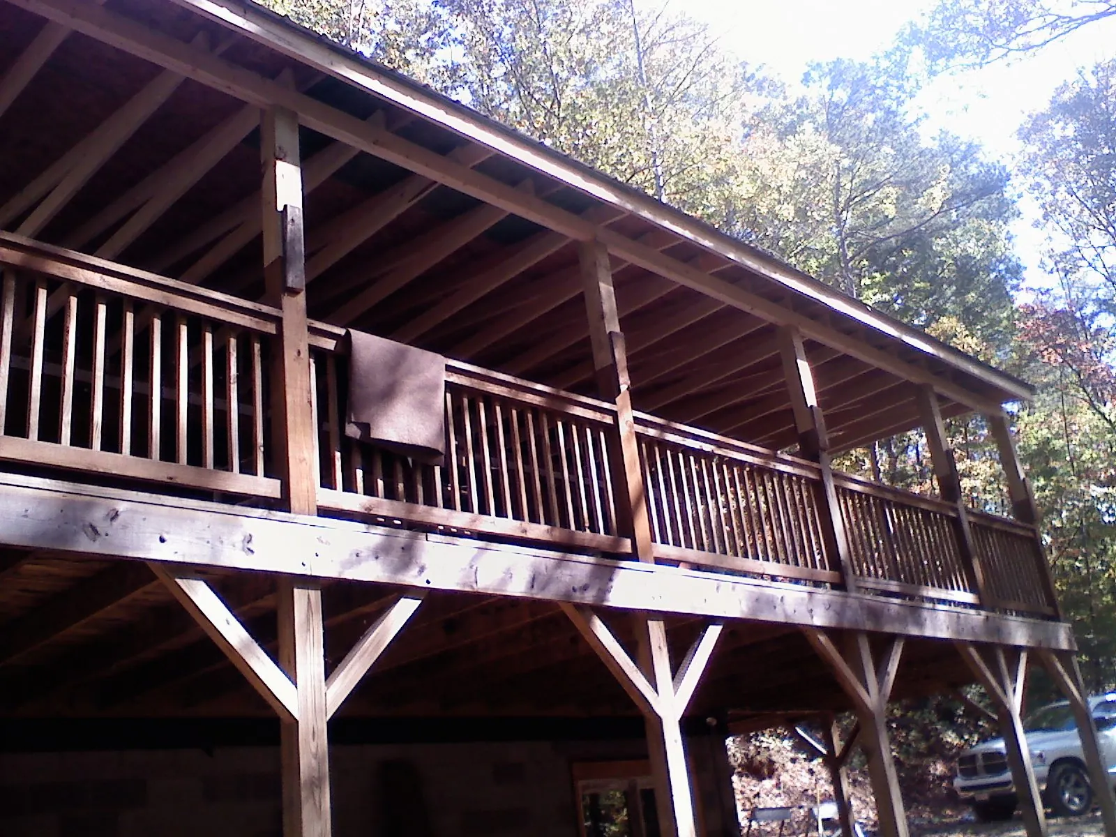 Timber framing under a new elevated porch and deck — Roof Leak Repair in Green Ridge by Roofing Brothers